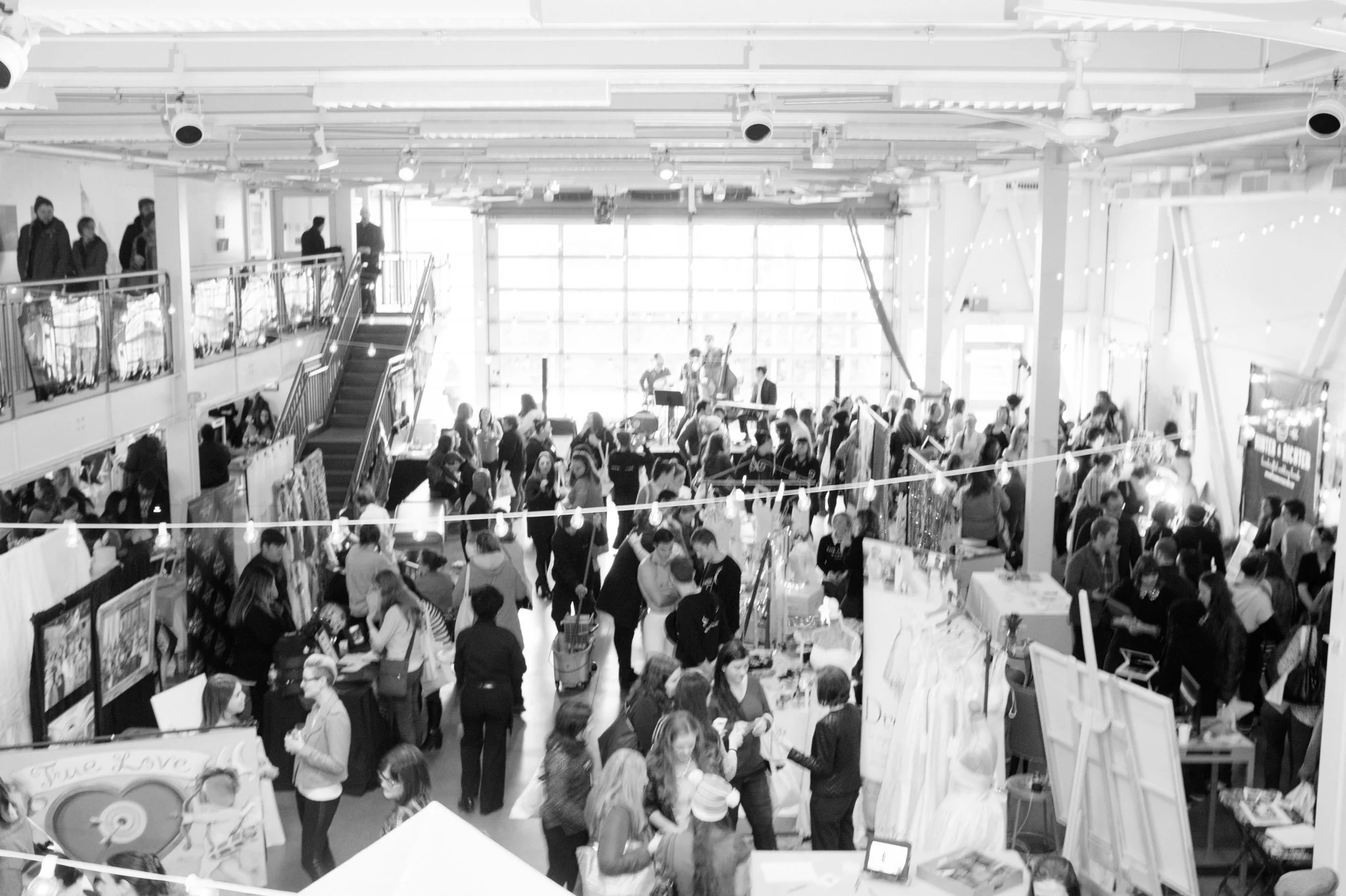 Just about 400 people, amazing vendors, circus performers and a jazz band playing Meghan Trainor songs. 