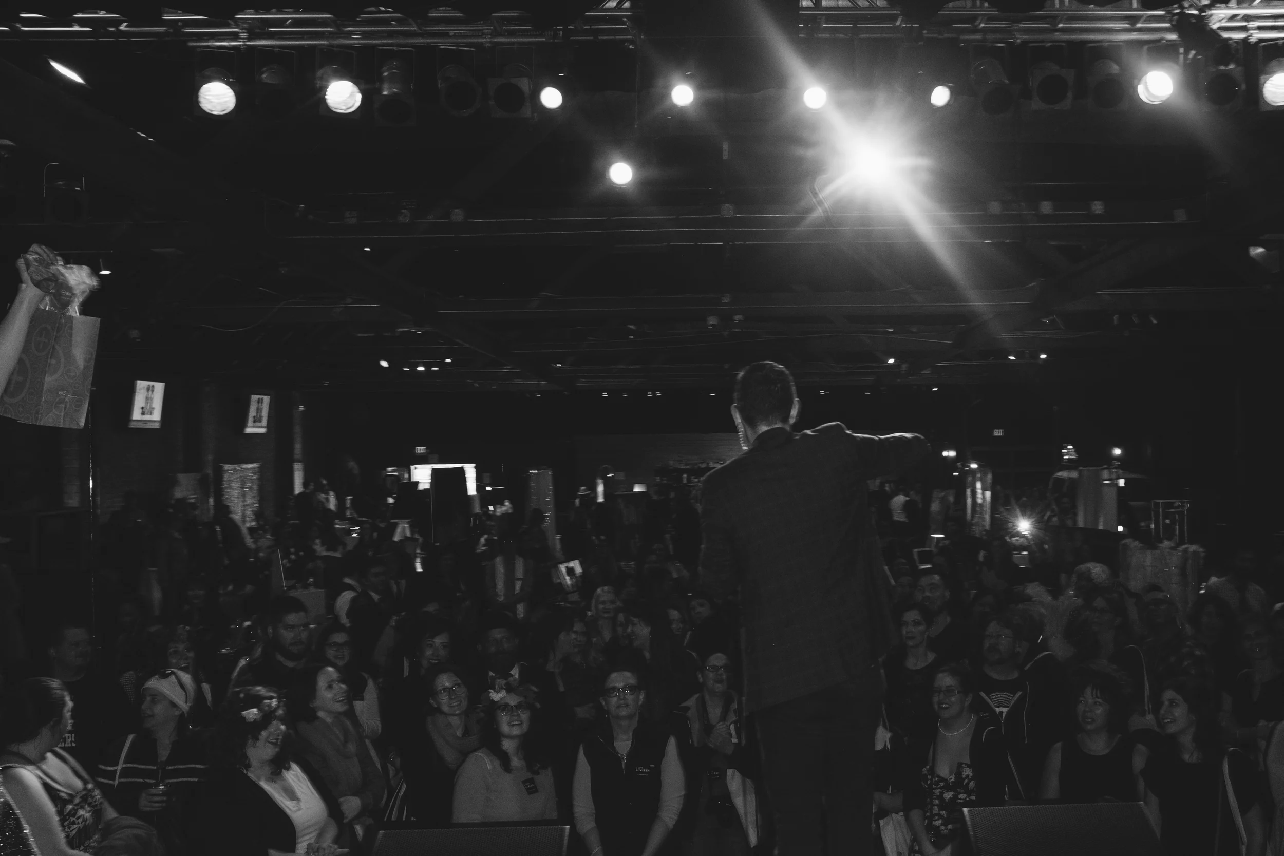 Tom, on stage, giving dope shit away.