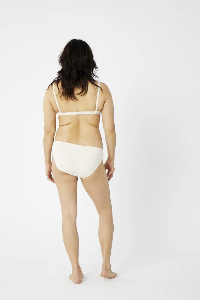 Back view of Pansy low-rise organic cotton underwear in Natural.