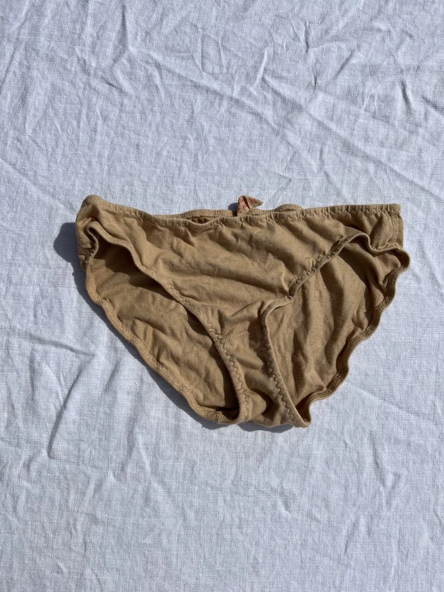 A flat photo of Pansy organic cotton low-rise underwear in the color sand.