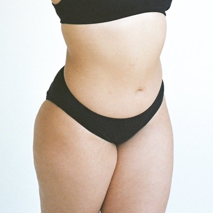 Close-up of Pansy low-rise organic cotton underwear in Black.