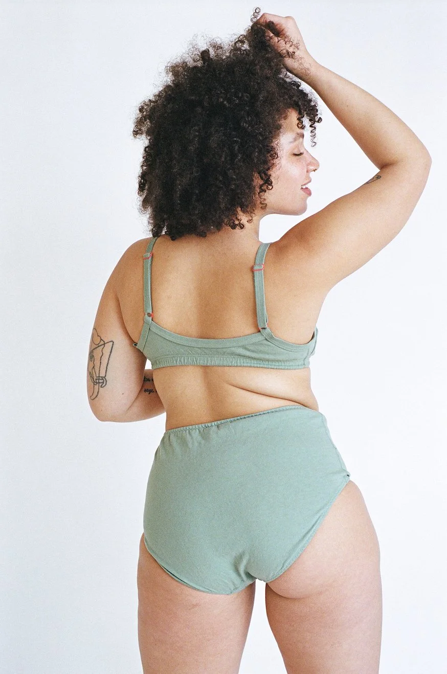 Rear view of Pansy high-rise organic cotton underwear in the color Mermaid.