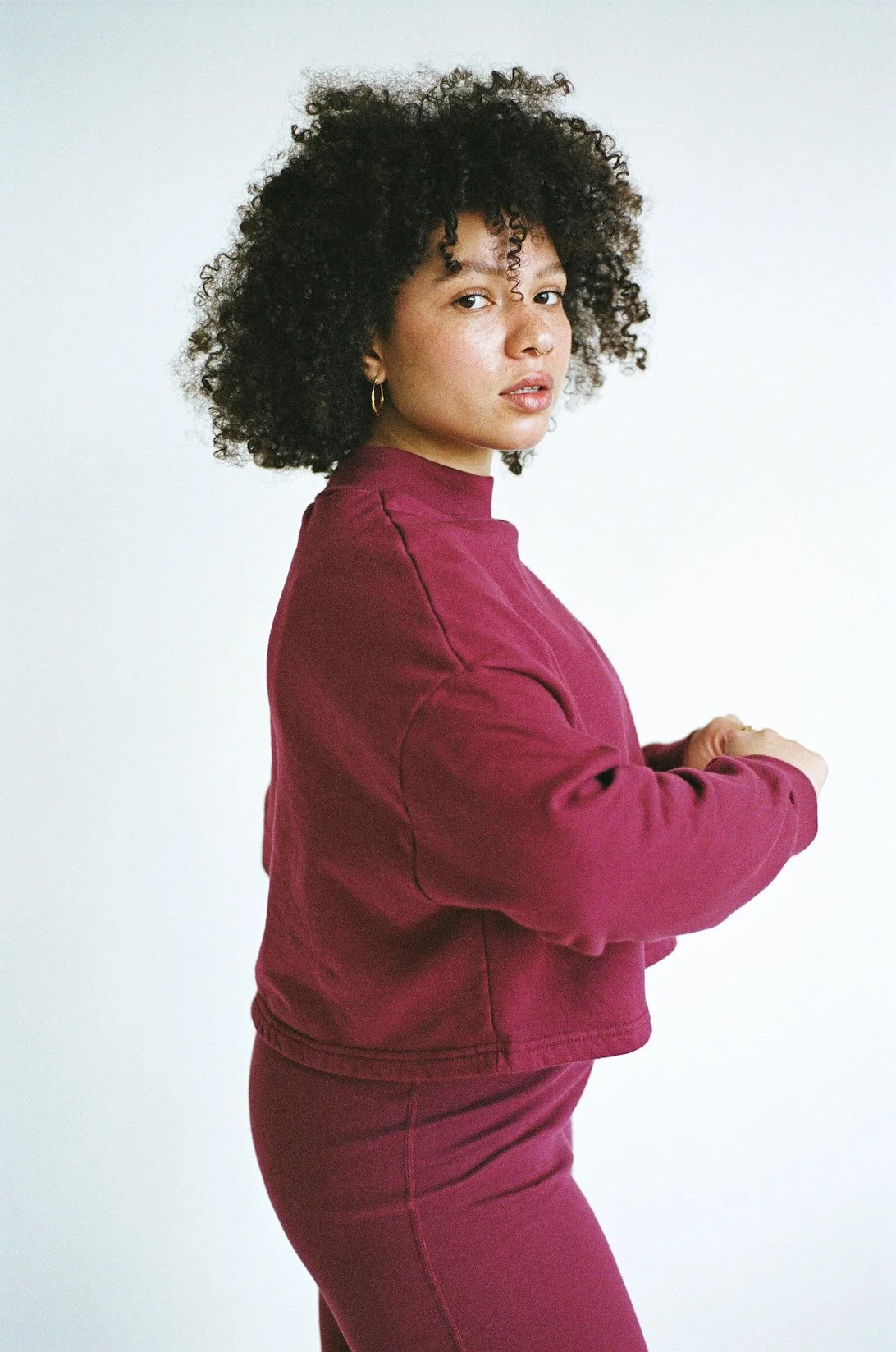 Side view of Fleece Top in Wine.