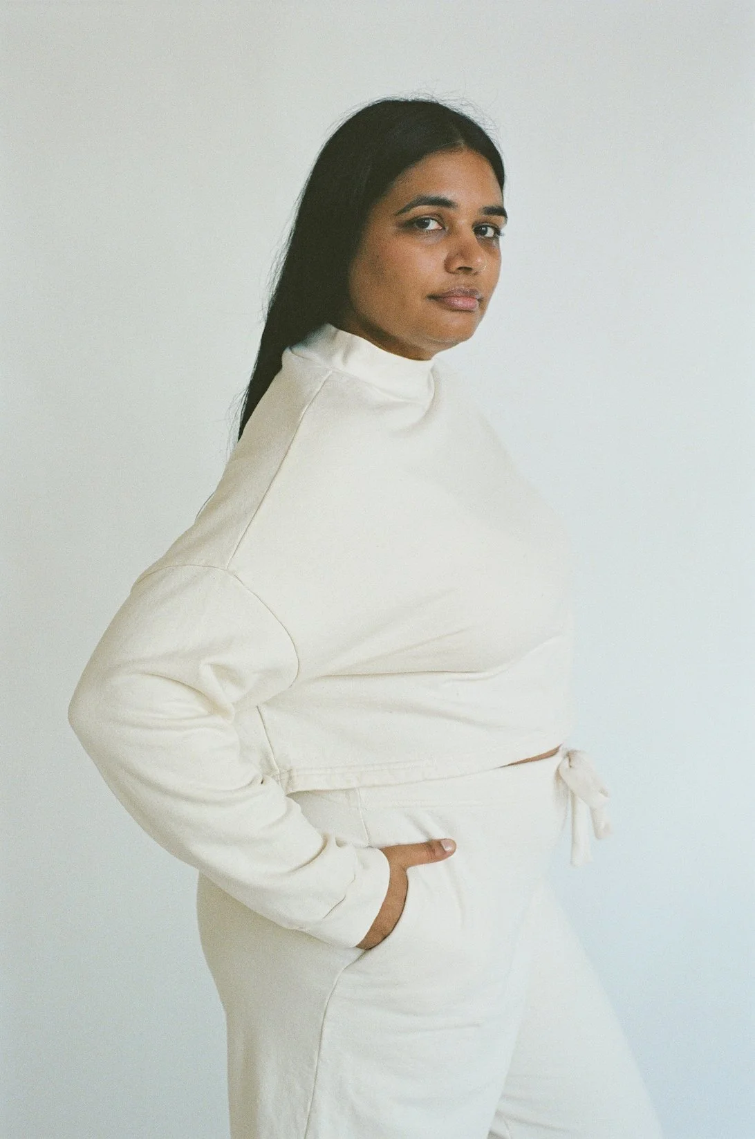 Side view of Pansy Fleece Top in Natural.