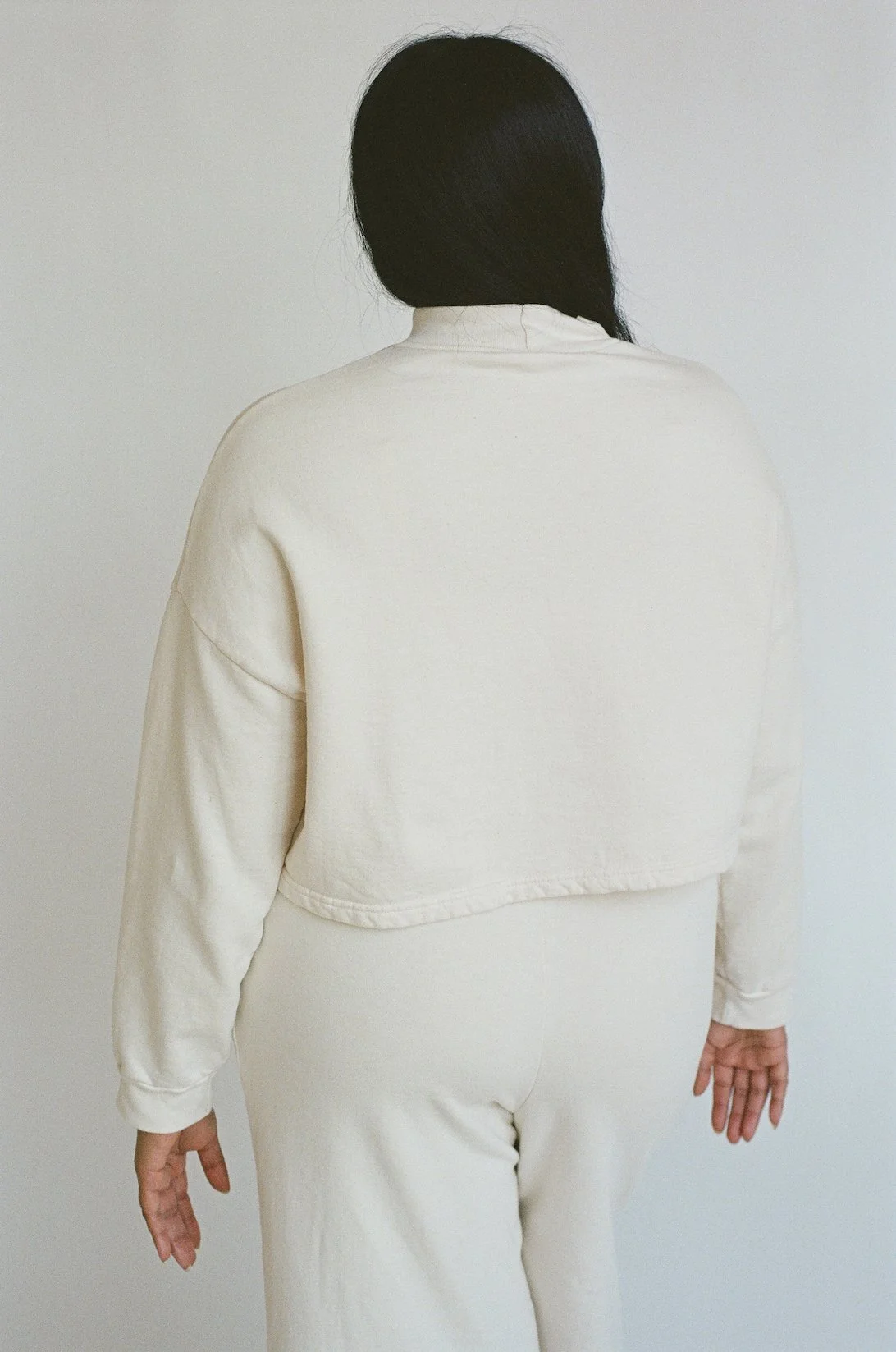 Back view of Pansy Fleece Top in Natural undyed organic cotton.