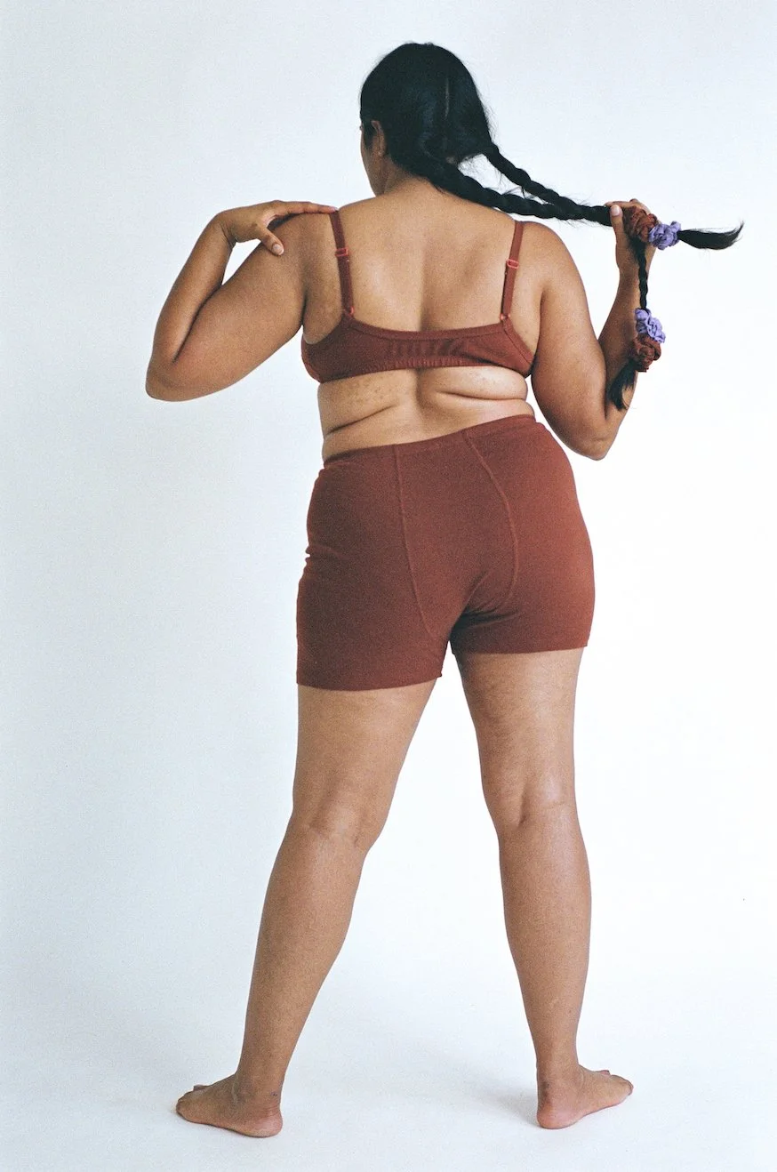 Rear view of Pansy Stretch Shorts in the color Wine.