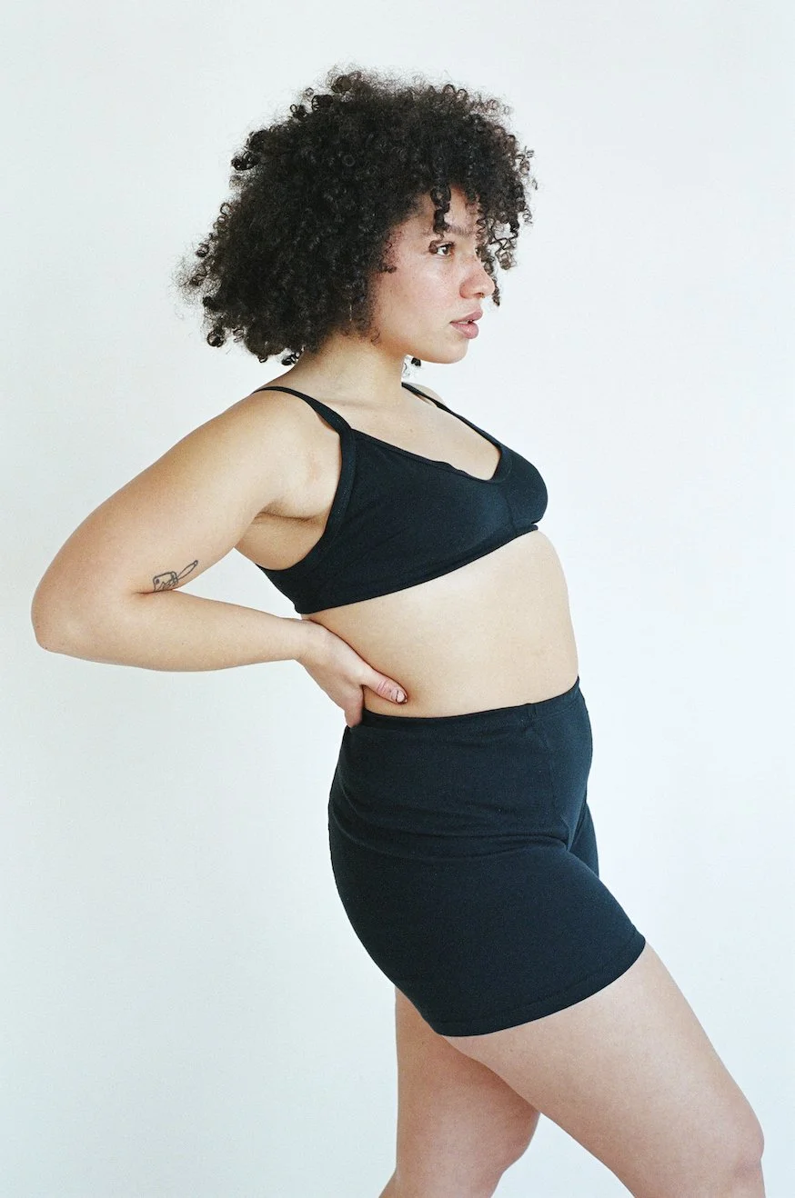 Side view of Pansy Stretch Shorts in Black.