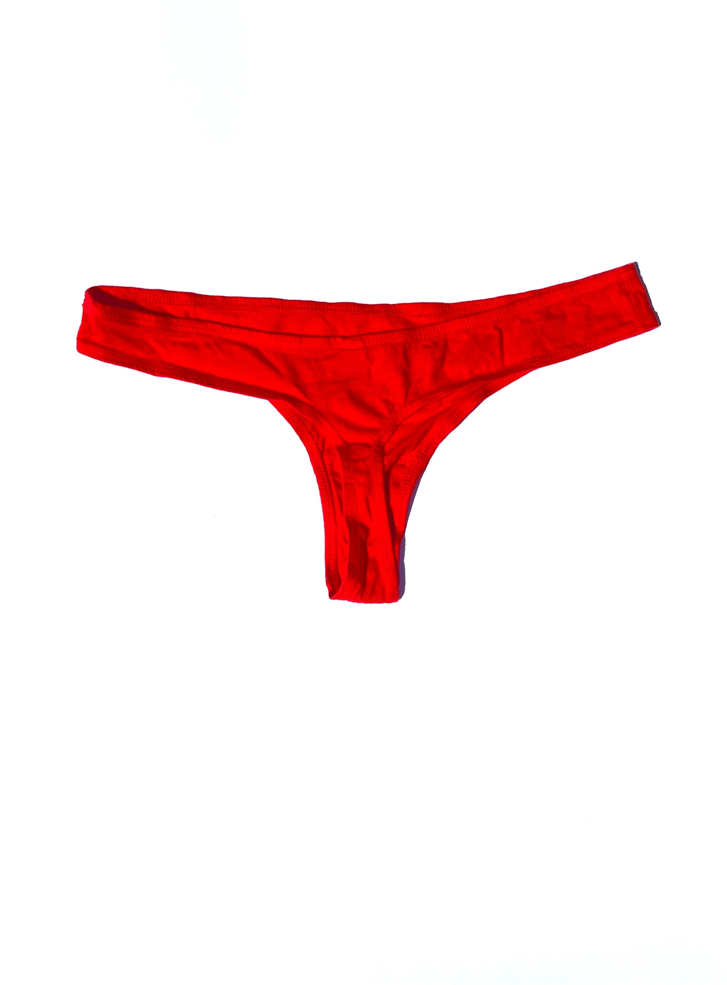 Rear flat view of the Pansy organic cotton thong in Red