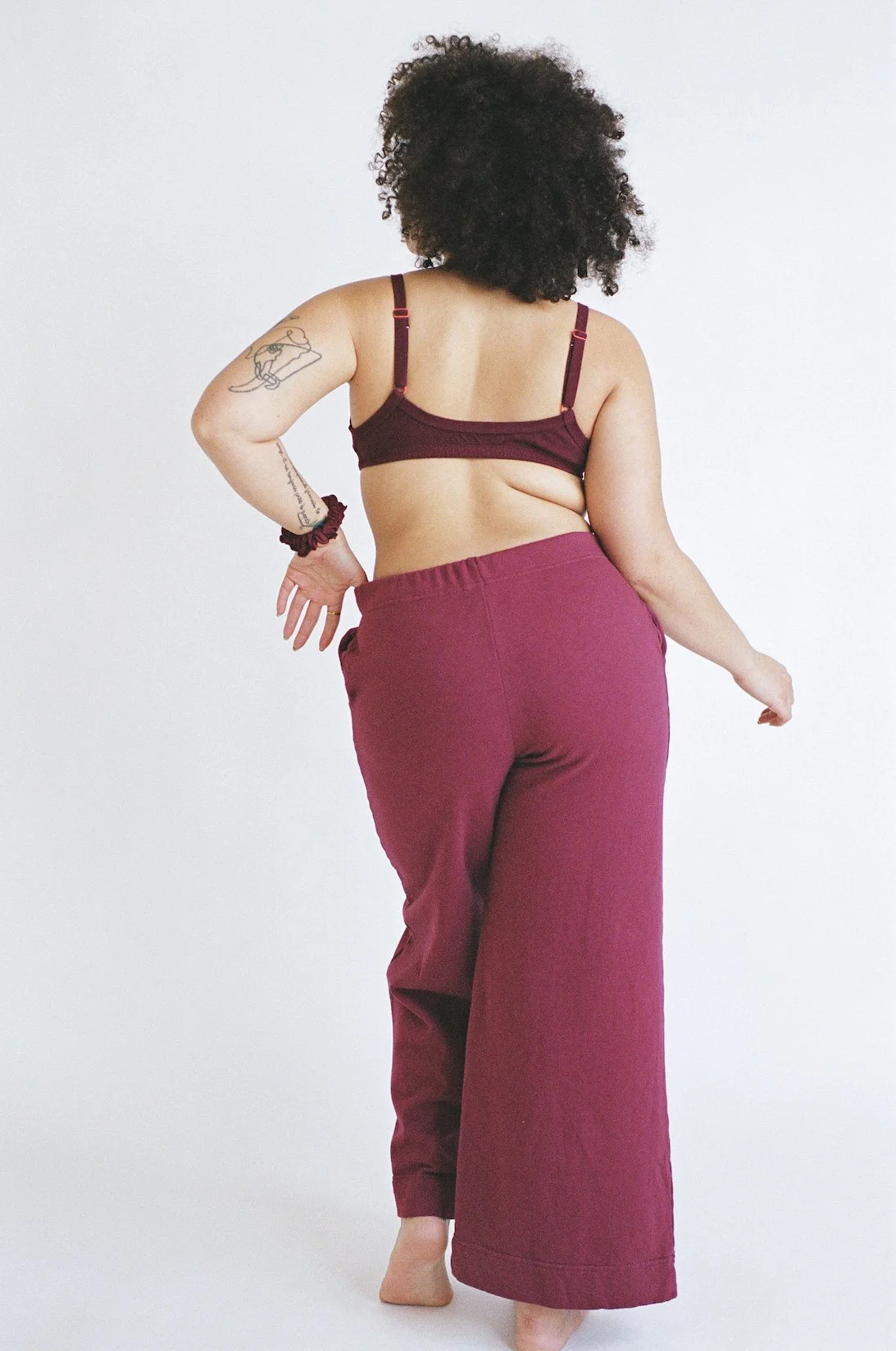 Back view of Pansy US organic cotton fleece pants in Wine.
