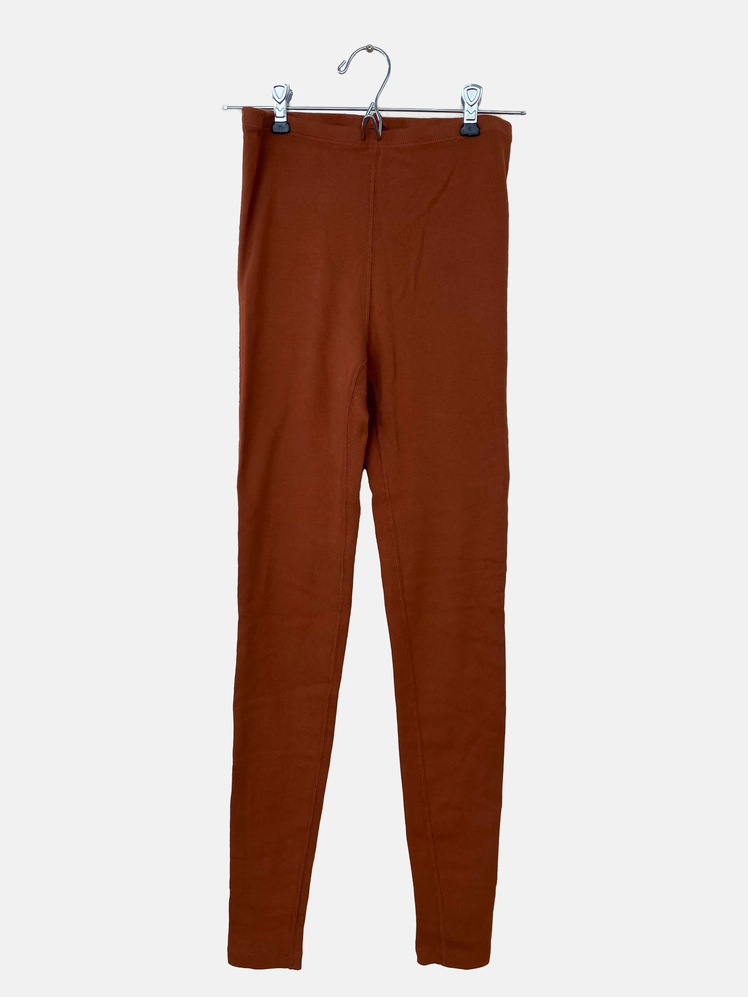 Rust leggings on hanger