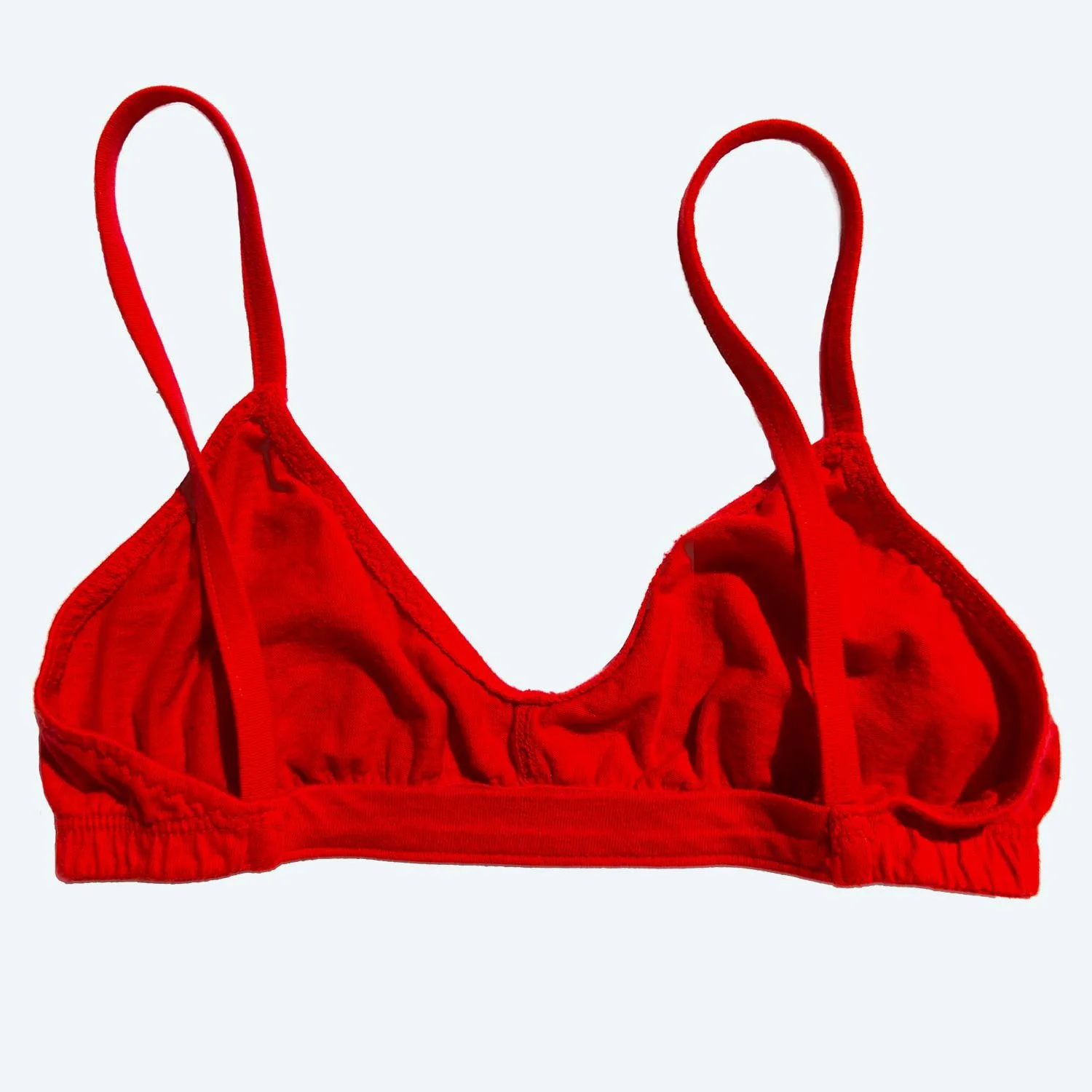A Pansy organic cotton bra in red viewed from the back