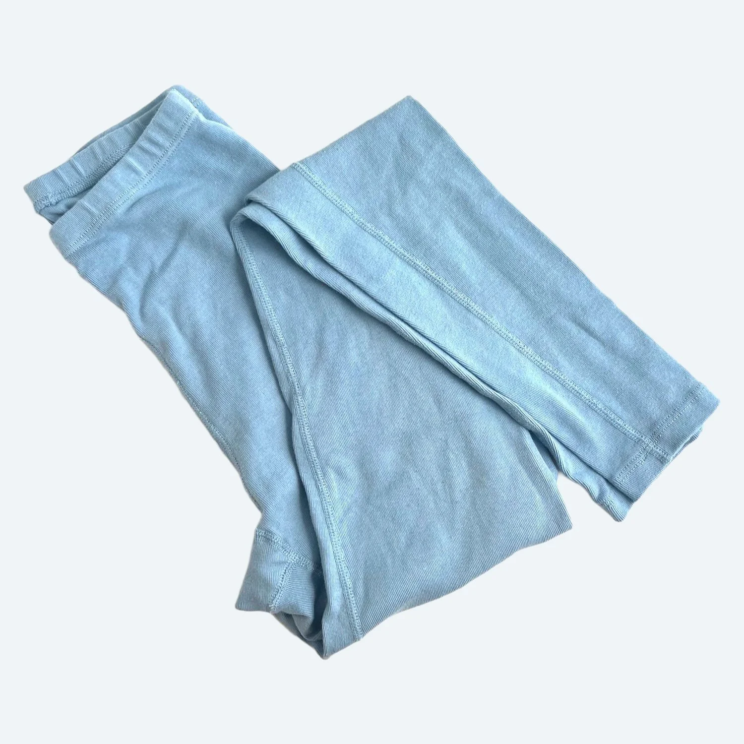 Pansy organic cotton Leggings in Sky blue, folded to show the waistband and ribbed fabric.