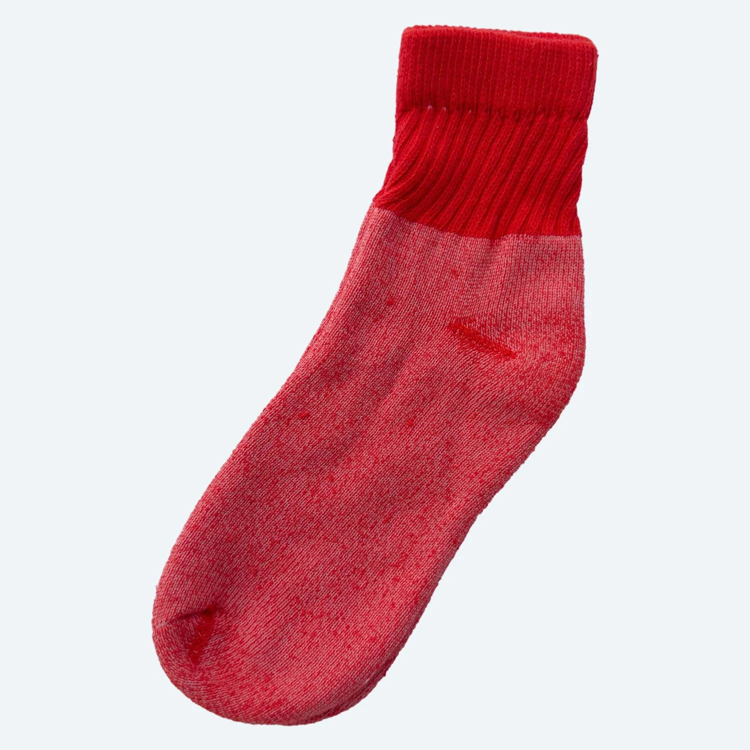 Pansy organic cotton short socks in Red, laid flat with ribbed cuffs.