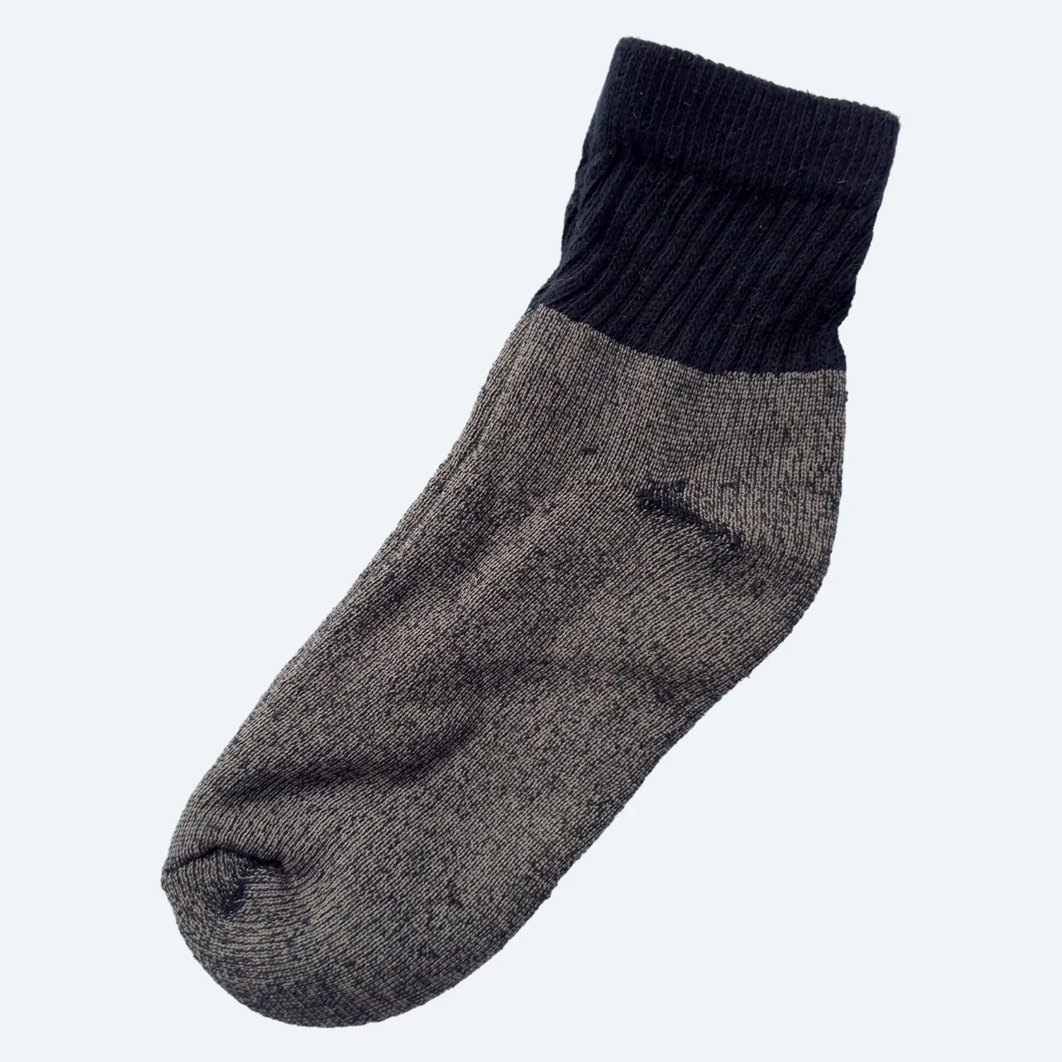 Pansy organic cotton short socks in Black, laid flat with ribbed cuffs.