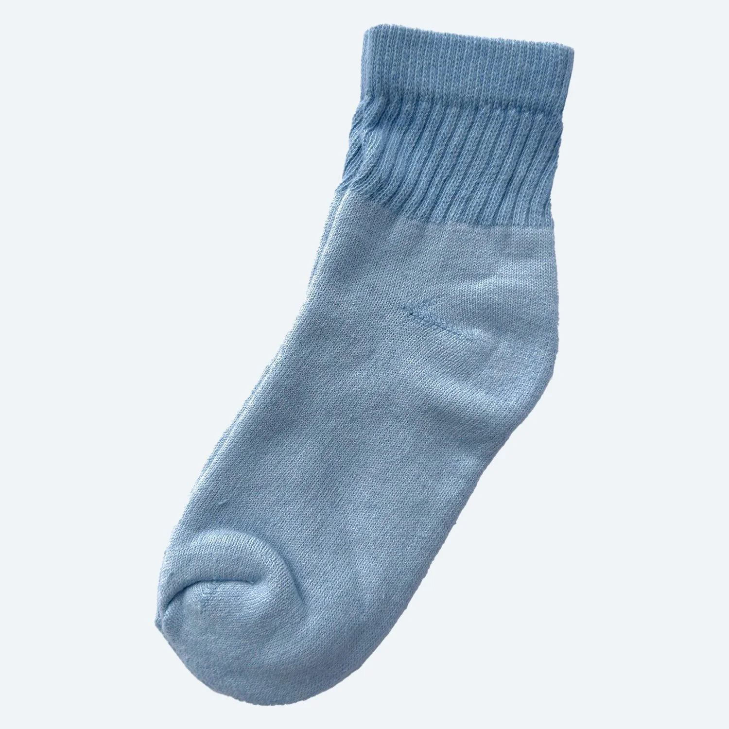 Pansy organic cotton short socks in Sky blue, laid flat with ribbed cuffs.