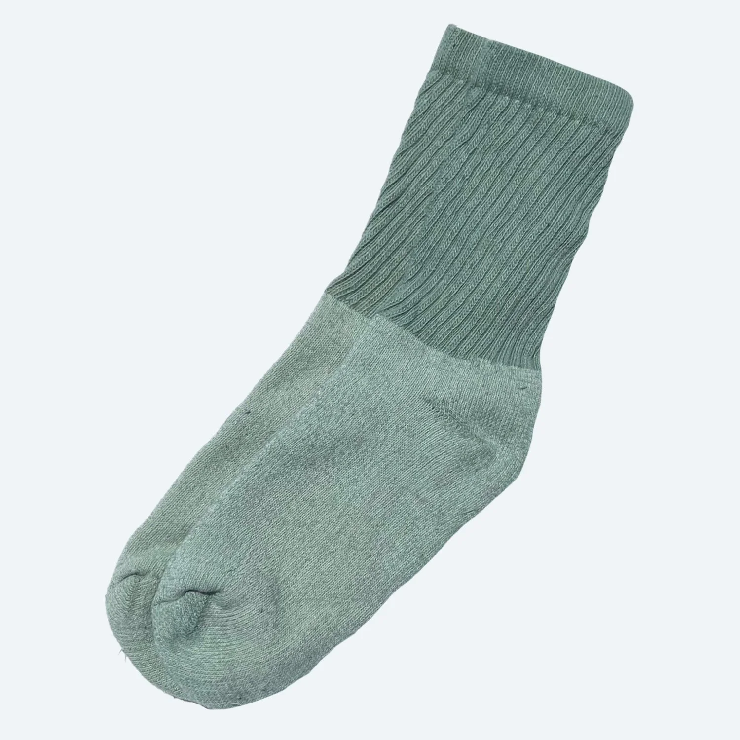 Pansy organic cotton tube socks in Mermaid green, laid flat with ribbed cuffs.