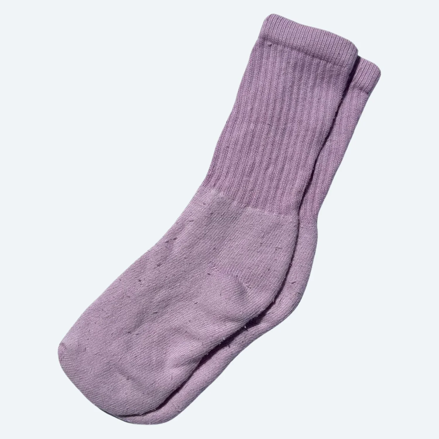 Pansy organic cotton tube socks in Blossom pink, laid flat with ribbed cuffs.