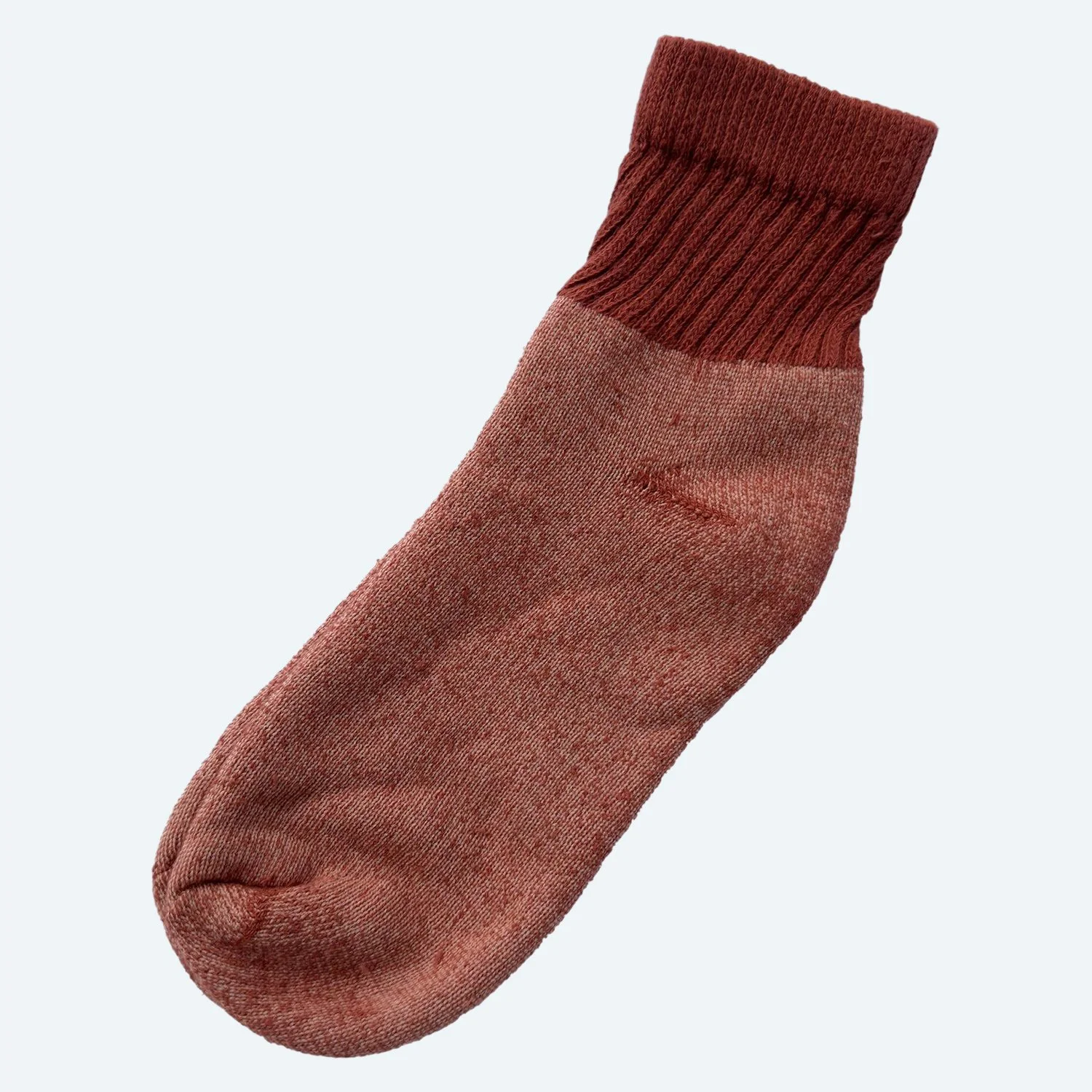 Pansy organic cotton short socks in Rust, laid flat with ribbed cuffs.