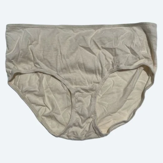 Flat lay of Pansy weird high rise underwear in natural on a pale blue-gray background.