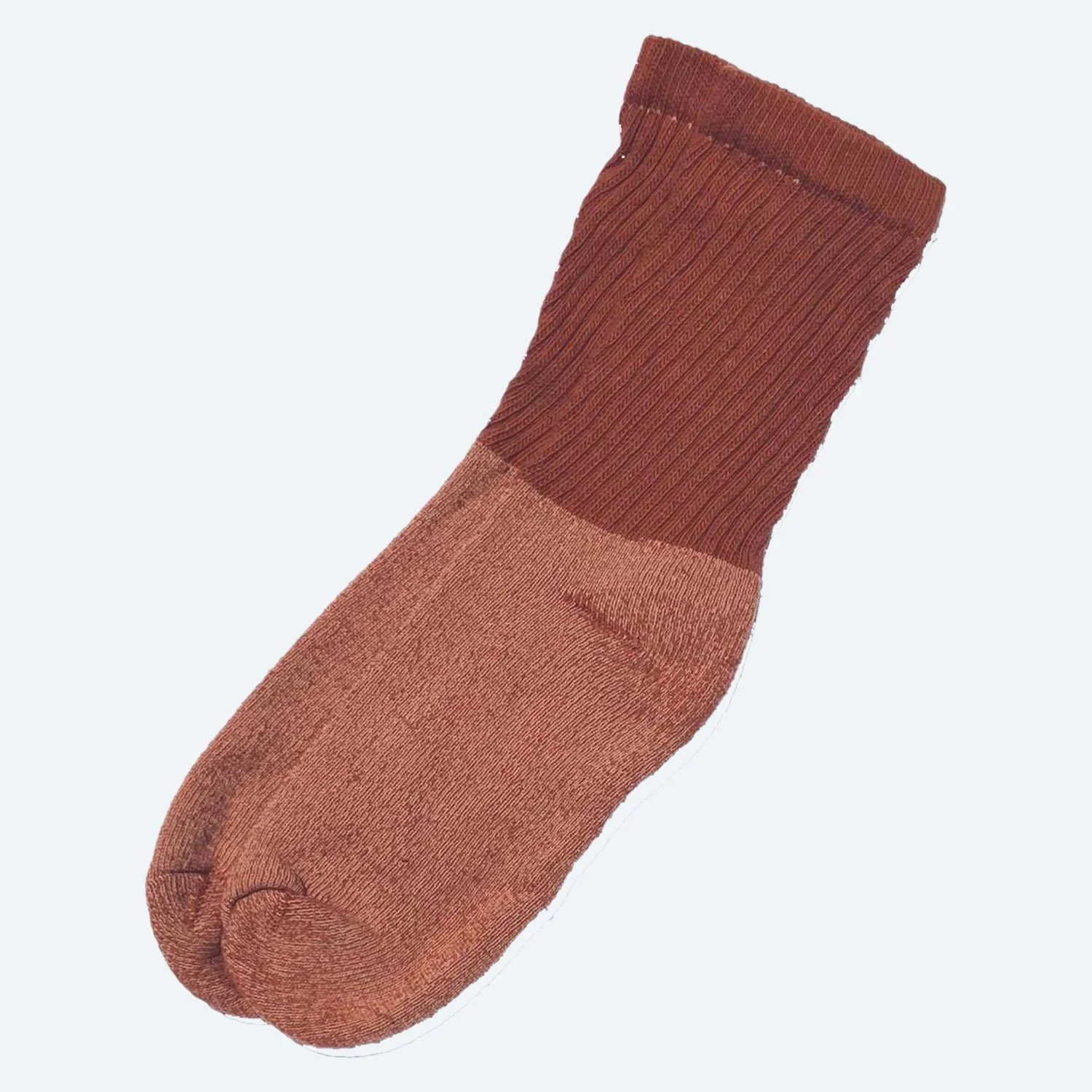 Pansy organic cotton tube socks in Rust, laid flat with ribbed cuffs.