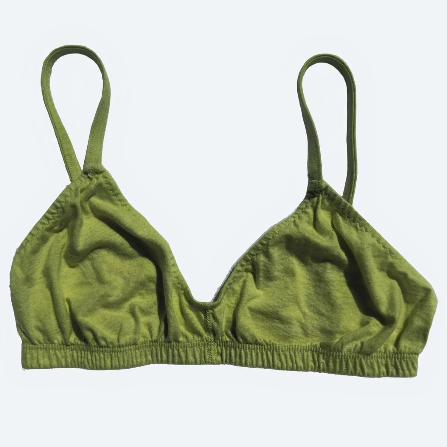 Pansy Bra in Moss green, laid flat from the front with thin straps, a V neckline and a gathered underband.