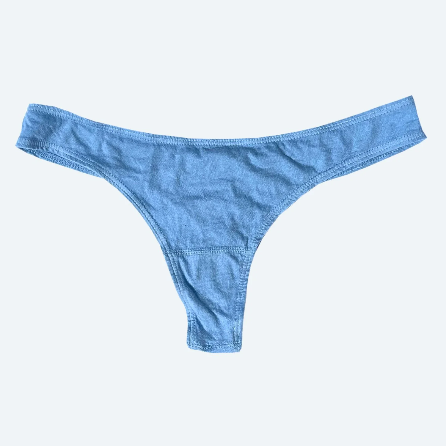 Front flat view of the Pansy organic cotton thong in Sky blue