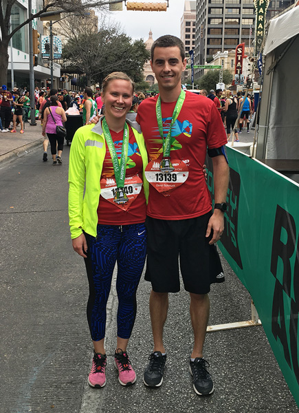 Kristina and her husband showing off their Finisher's medals at the 2016 Austin Marathon.