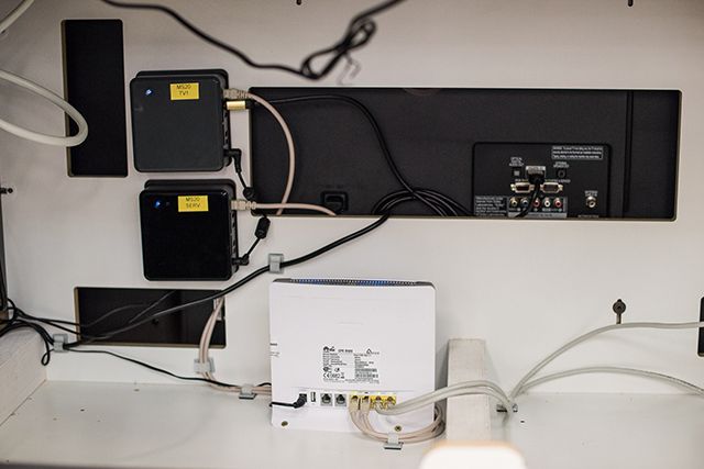 Components inside the main bench, there's a media player, the server and the wireless router that sends command signals to the surfaces.