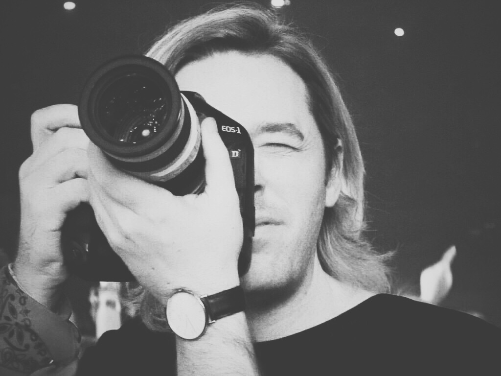I alos had to supply photography for management needs. the record label and the bands press agency on tour...Here's a photo taken by a fan of me taking a photo of the band performing live.