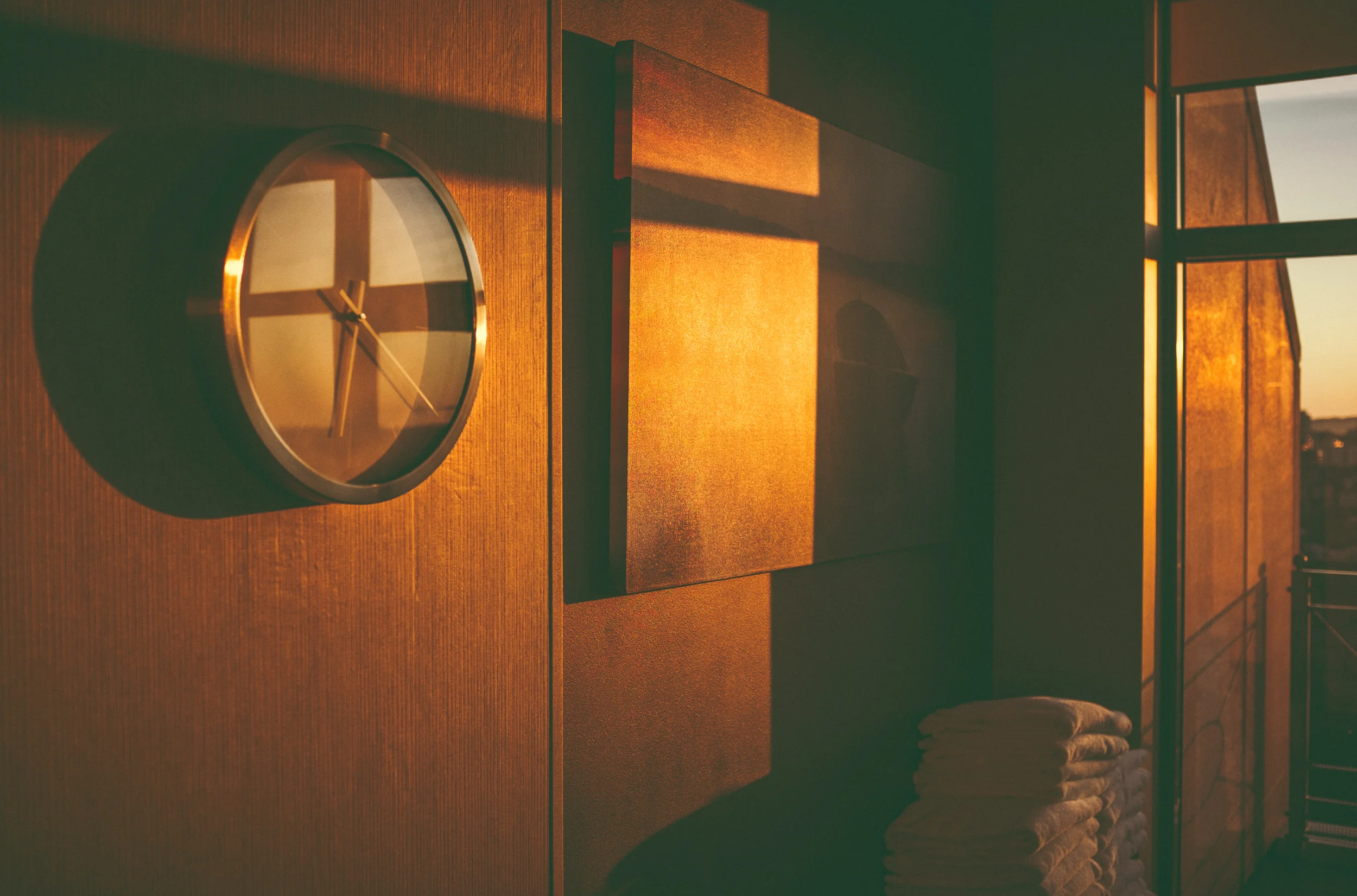 More reflections of the sunrise over Sydney at 622am (ish) this morning. That's the window reflection in the clock.