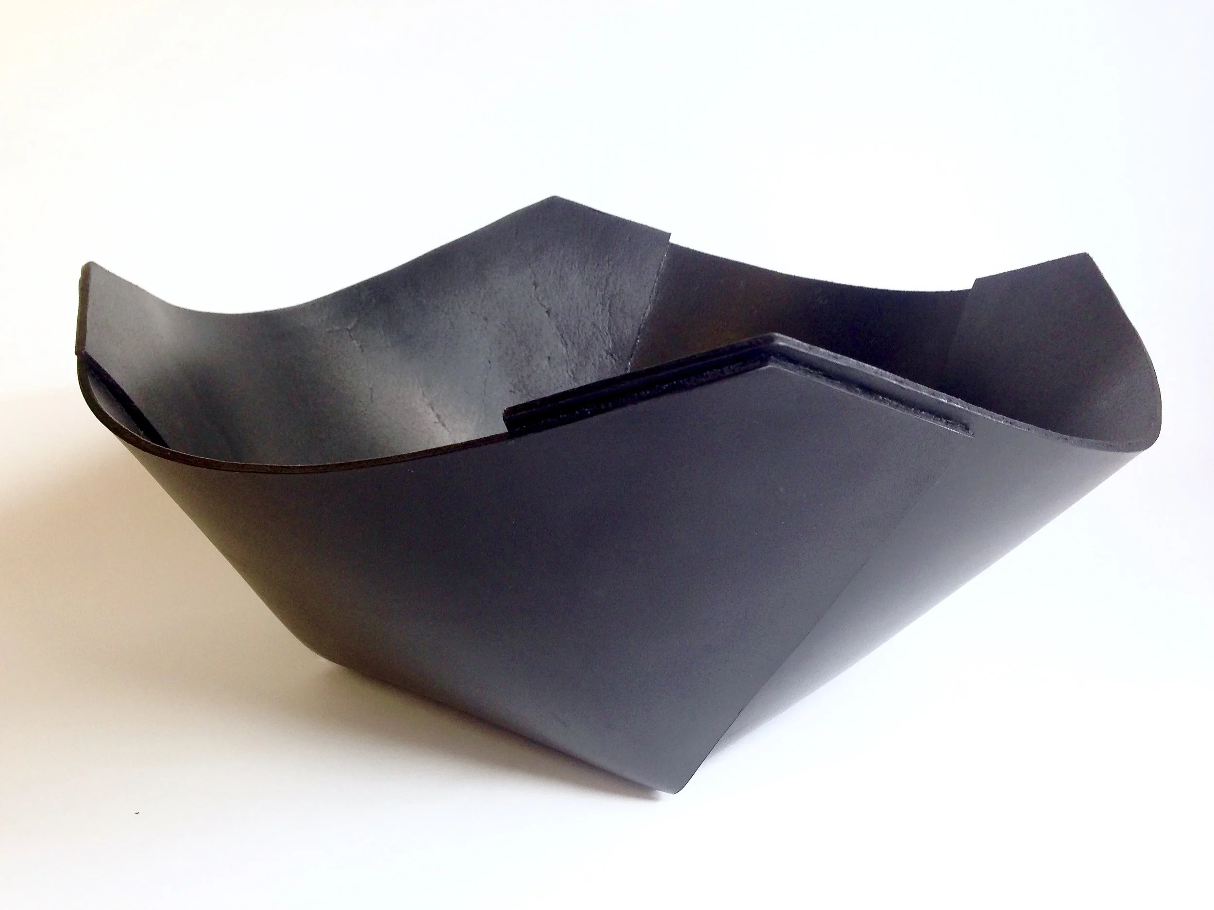 Folded leather bowl