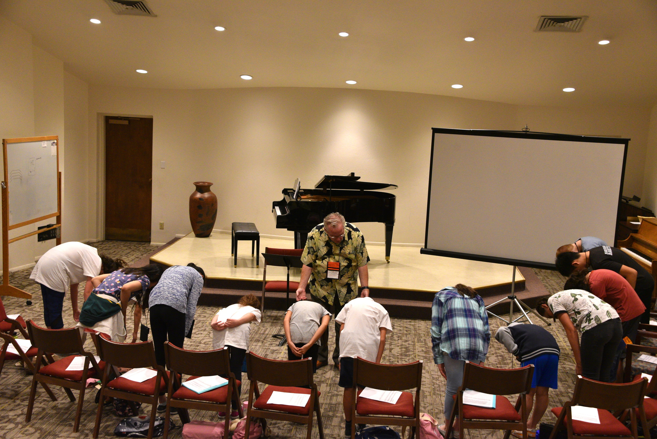 Don Bowing with Students.JPG