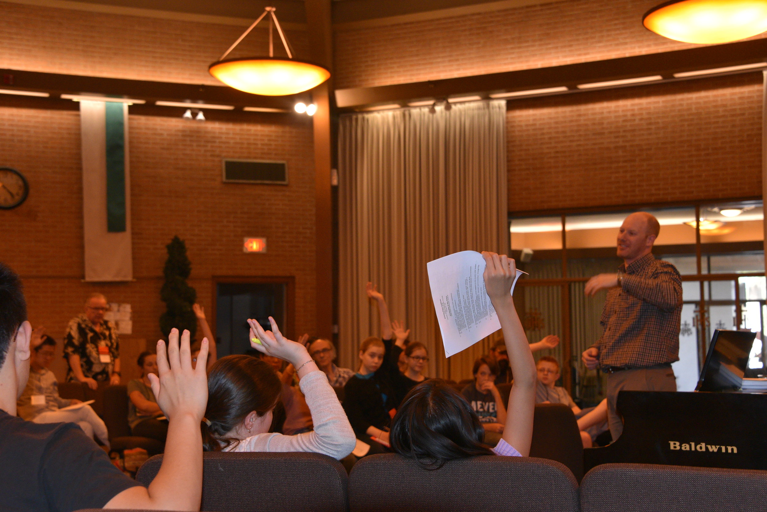 Kids Raising Hands for Elias.JPG