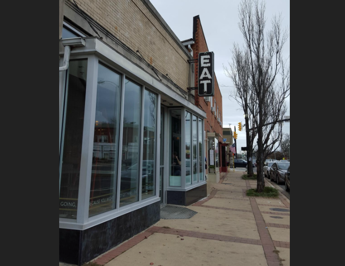  The "eat" sign on the building where the restaurant is located is historically protected, so the owners restored the sign and it will continue to light the way to the restaurant at 2671 Washington Boulevard.&nbsp;© Photo by Washington Business Journ