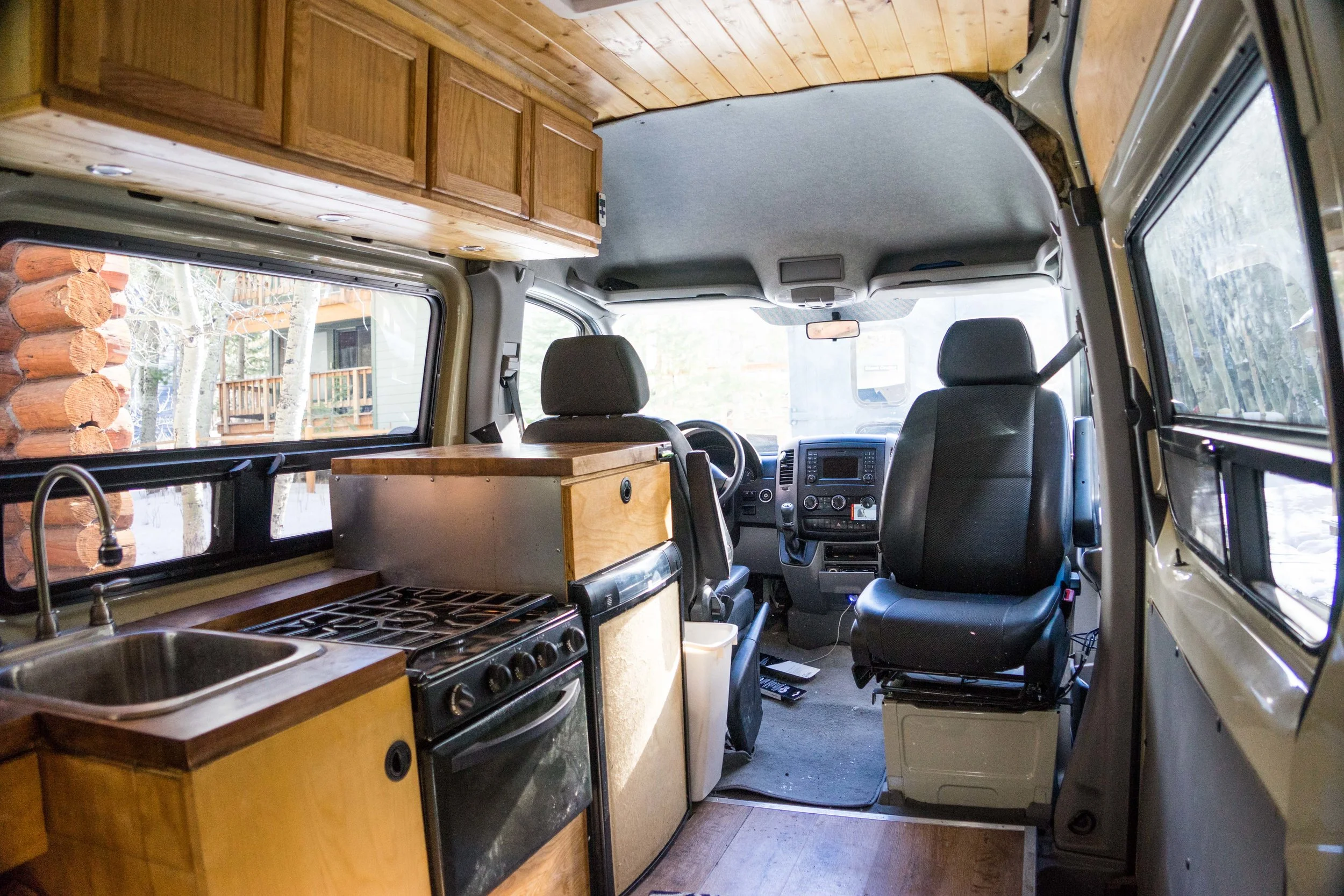 The layout looking forward from the bench seat. The front passenger seat spins.
