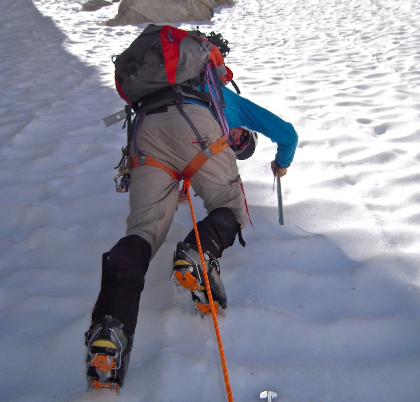 Climbing with ice axe and crampons