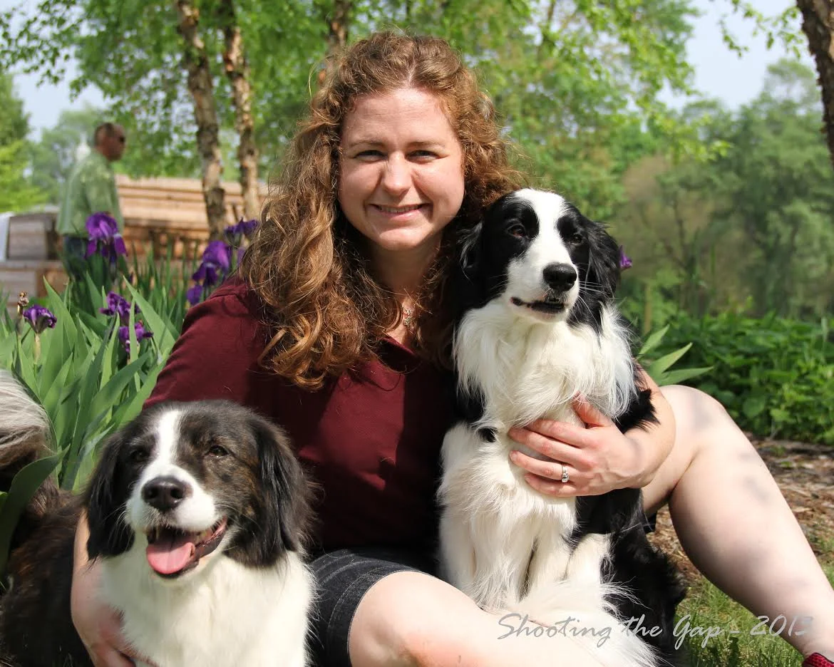 This is a photo of Dr. Woodside and her dogs Rory and Teigh from an event in Morris in 2012. Thank you to Shooting the Gap Photography for the awesome photo!!