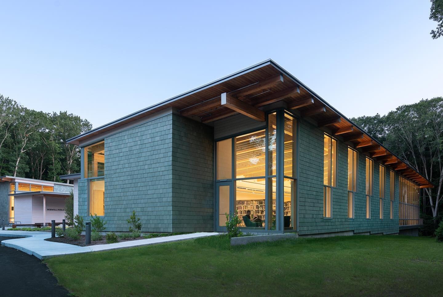 We&rsquo;re excited to share these beautiful photographs by Chuck Choi Architectural Photography of our recently completed @norwellpubliclibrary which were just featured on ArchDaily! Link in bio.