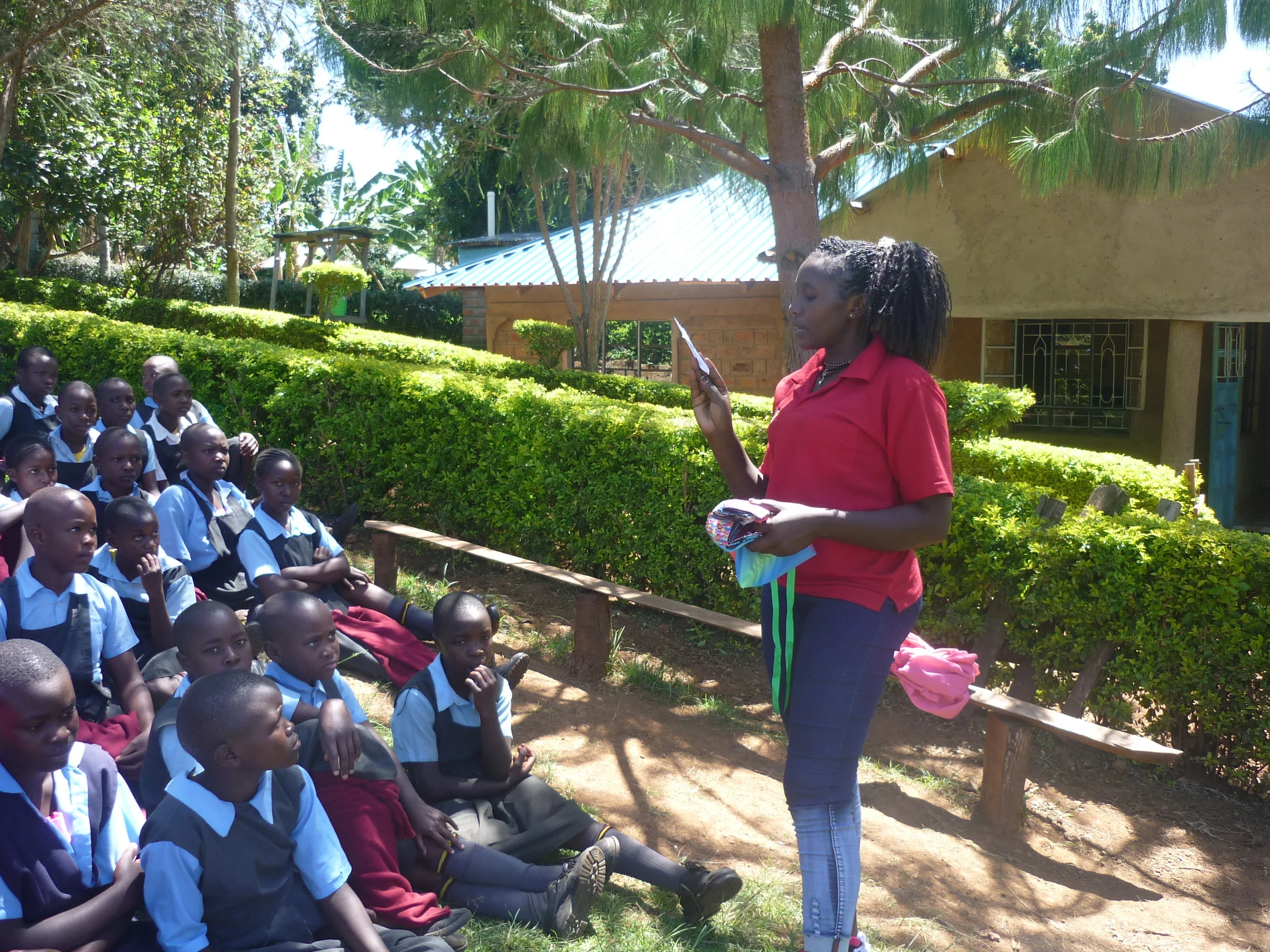 GSP Program Officer, Lonah Maiko providing education to girls at Precious Talent Academy