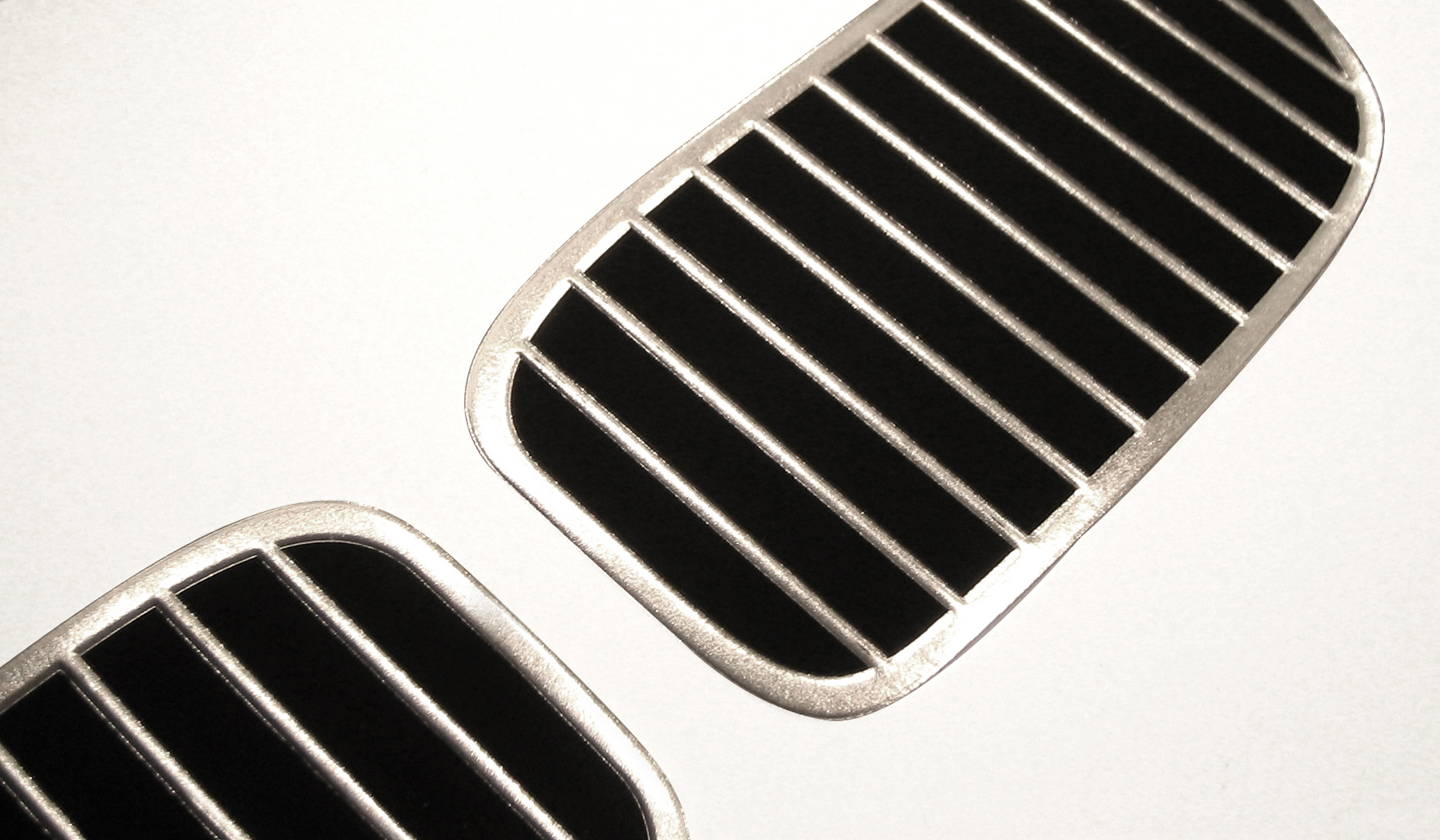BMW — An innovative 3D metal effect created out of paper and foil to show off their iconic grilles.