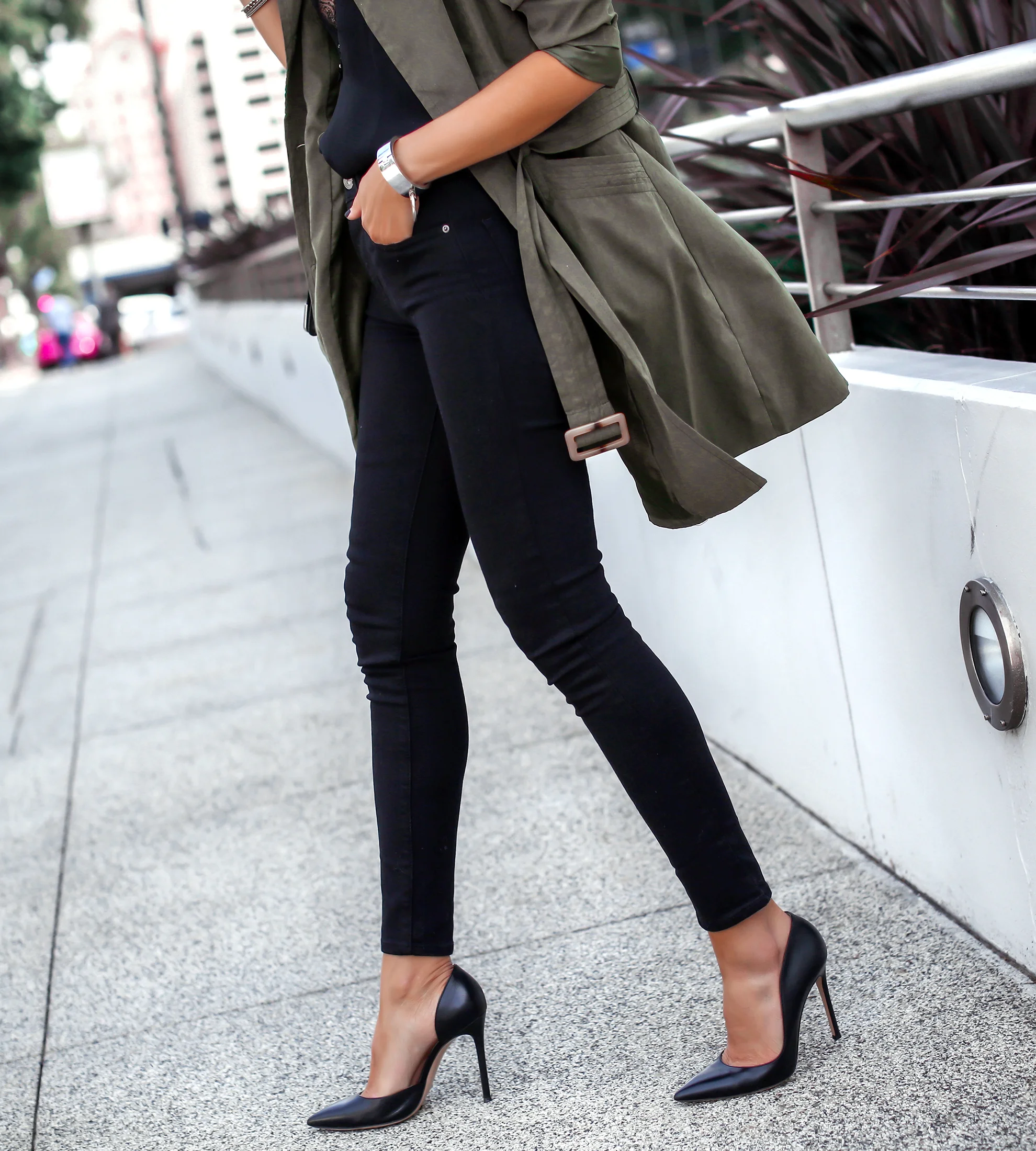 Woman Walking in Trench and Heels