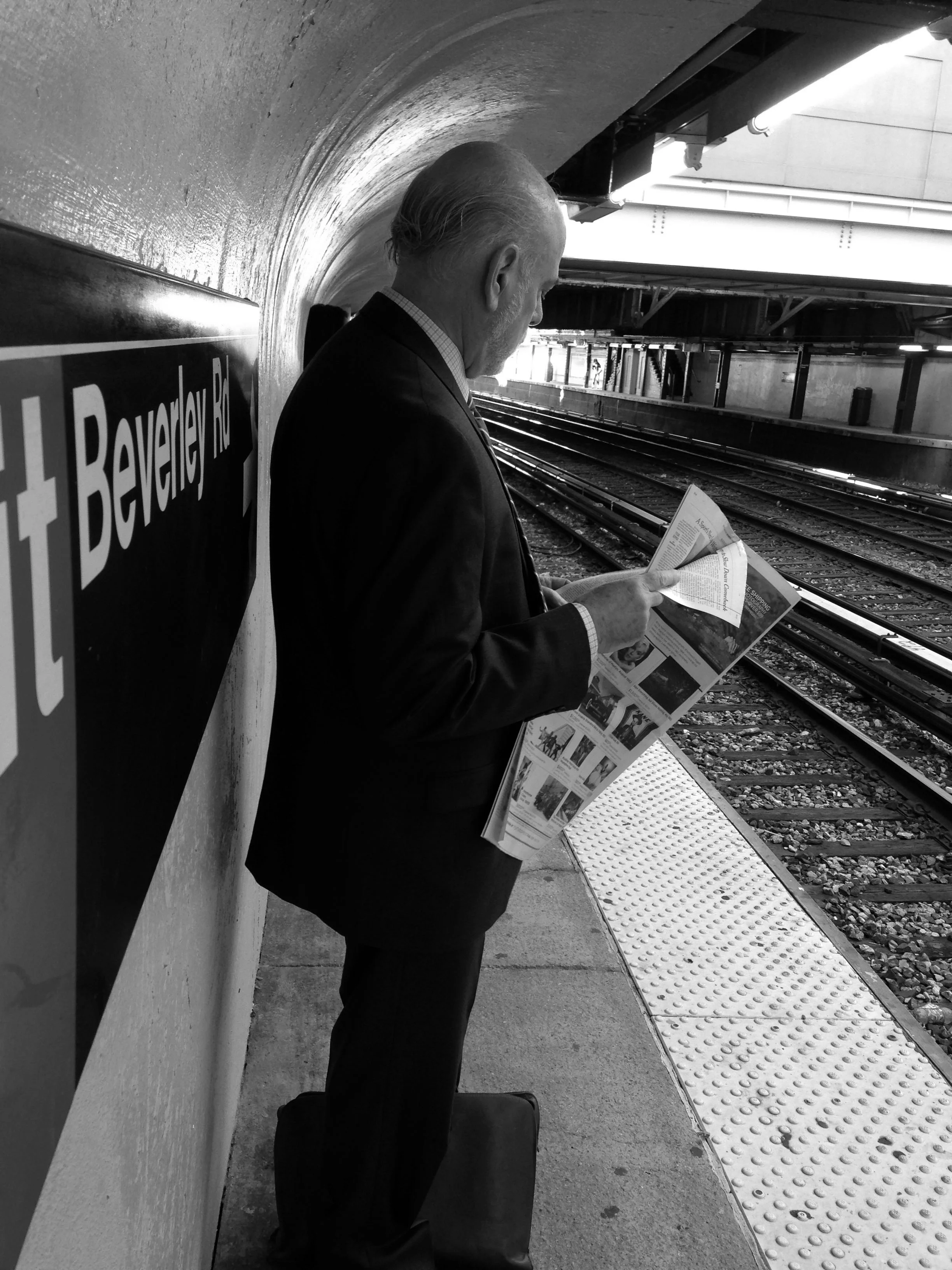 Man Waiting and Reading, Brooklyn, NY, 2014