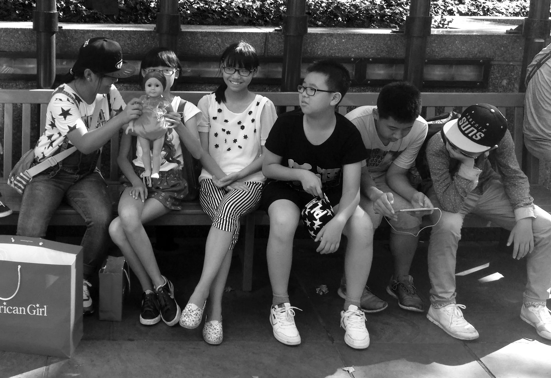 Kids Playing with Doll, NYC, 2014