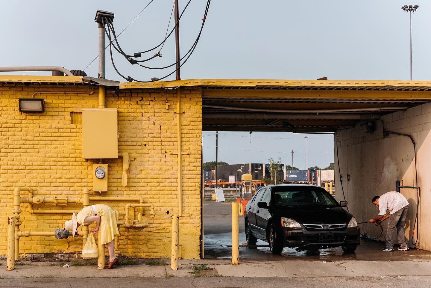 Let&rsquo;s play a game of I Spy Madalyn. ✨📷 by @chrisagerard from a 2019 dinner escapade in Detroit&rsquo;s Southwest, where I insisted my photo be taken in front of the yellow wall. It&rsquo;s not often your vintage dress, a car wash, &amp; the ba