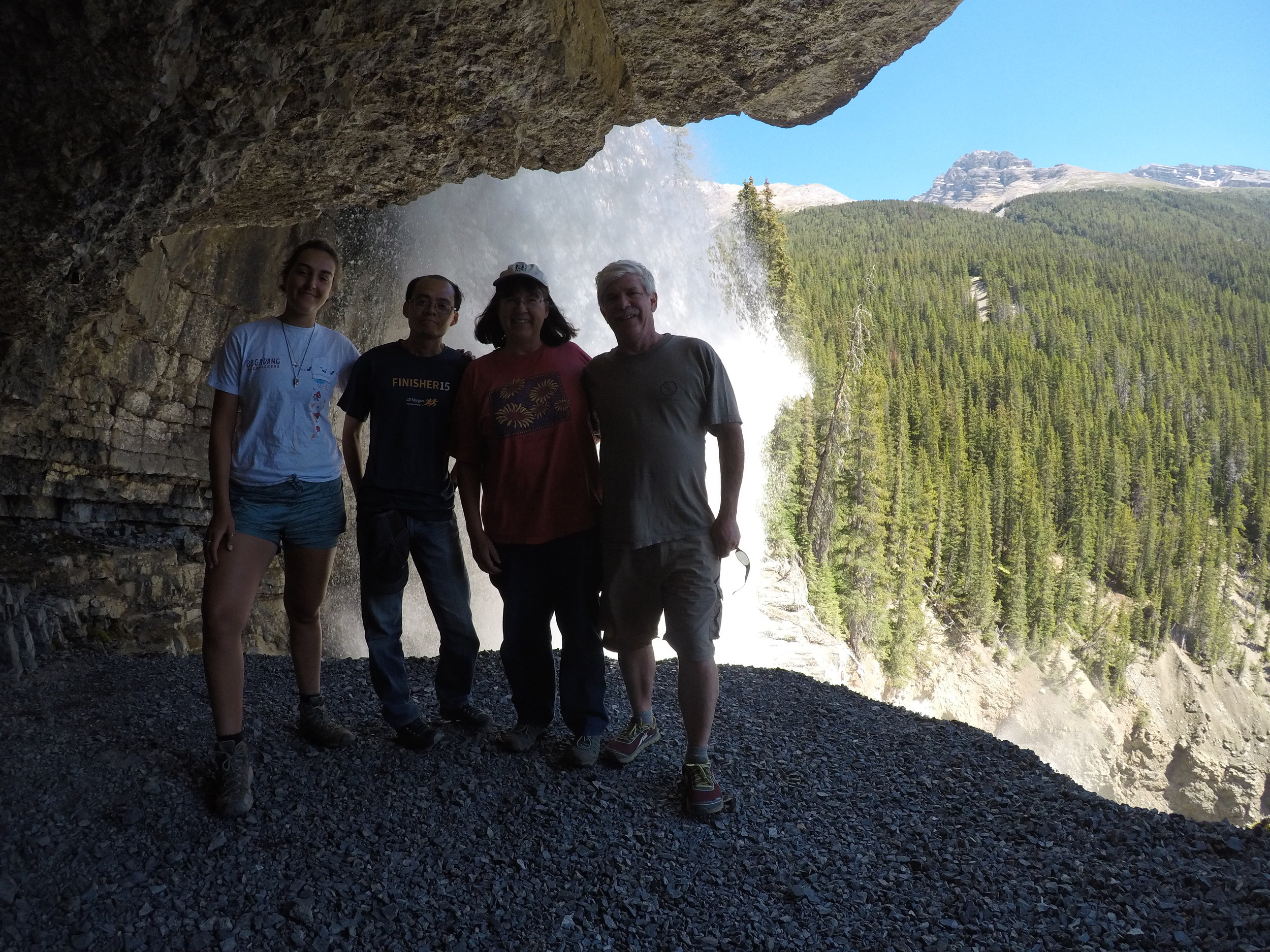 Waterfall adventure during a guided tour of the rocky mountains.