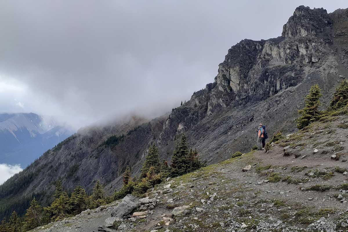 Stopping to enjoy the views while on a guided hiking trip in Whitehorse, Yukon.