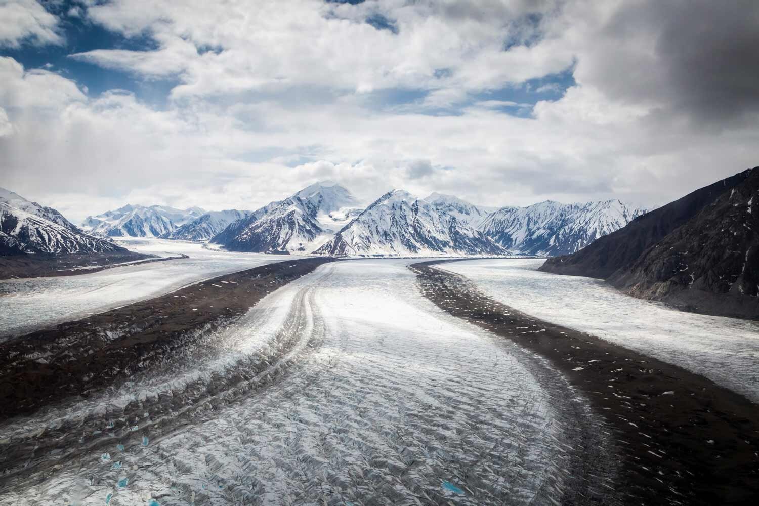 Looking at the Kaskawulsh Icefield while hiking in the Yukon in Kluane National Park.