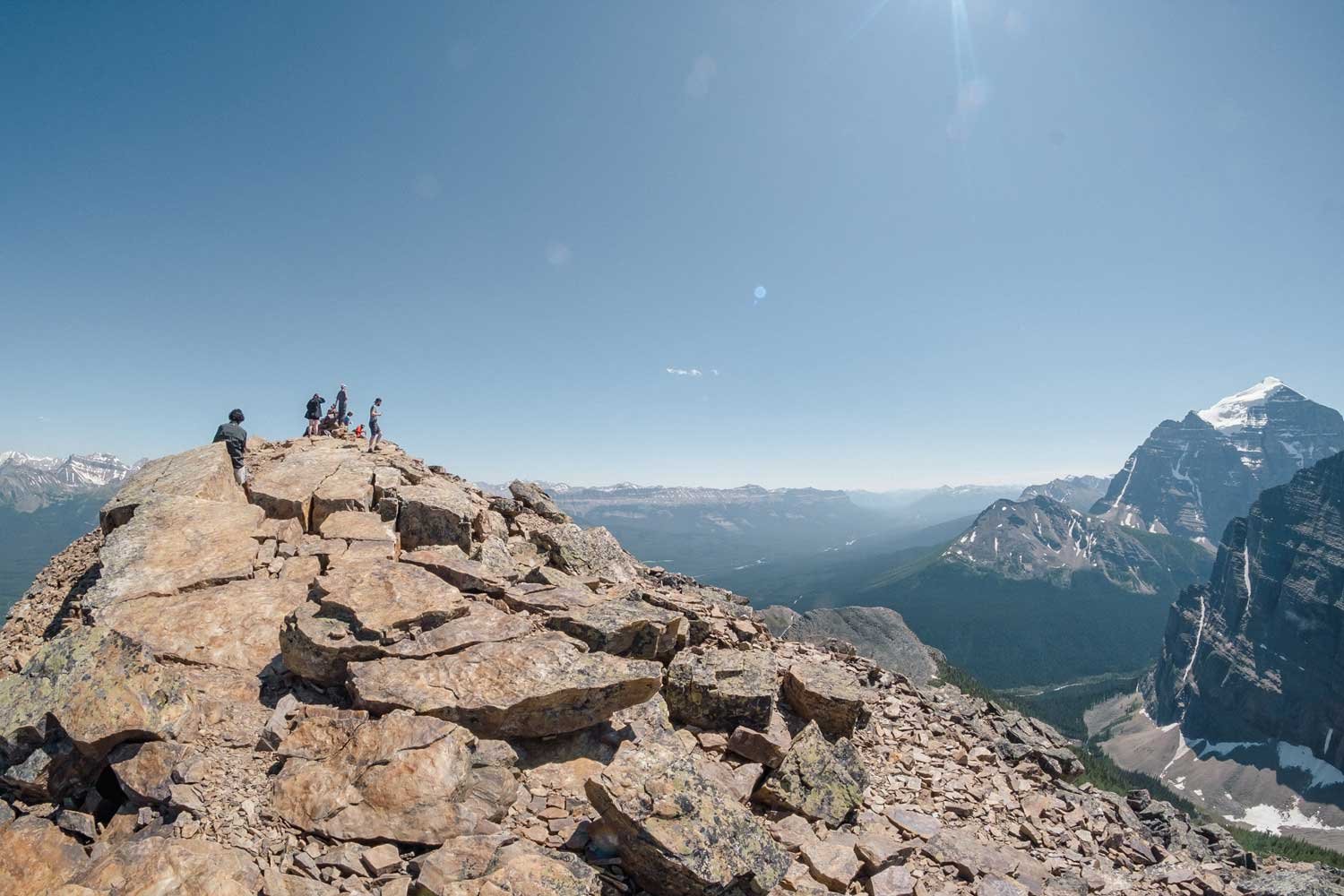 Small group hiking tour in the Rockies doing a camping tour package.