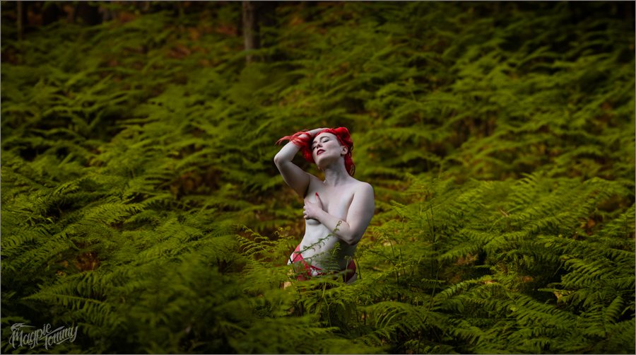 Topless women in ferns.jpg