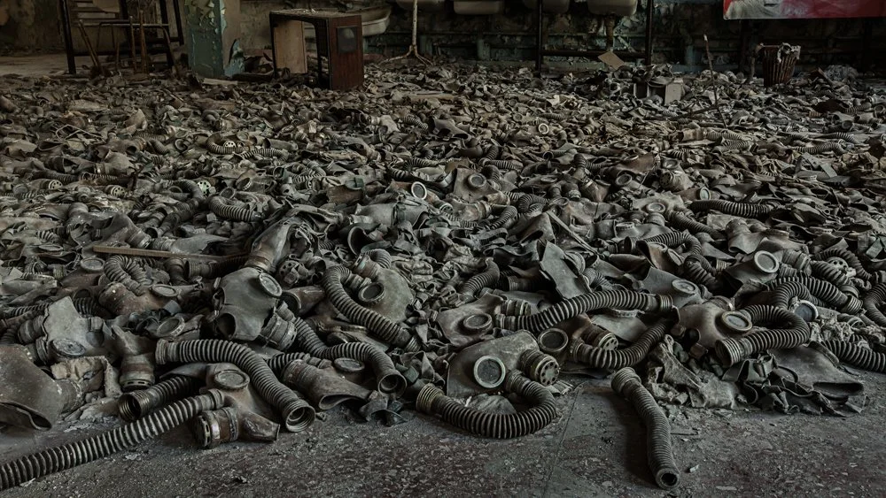  Hundreds of gas masks litter the floor in a derelict school, in the town of Pripyat close to Chernobyl. Full set on my&nbsp;  blog   .  